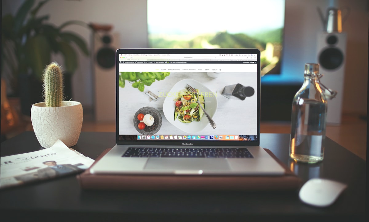 Family cooking together in a bright kitchen during an online class